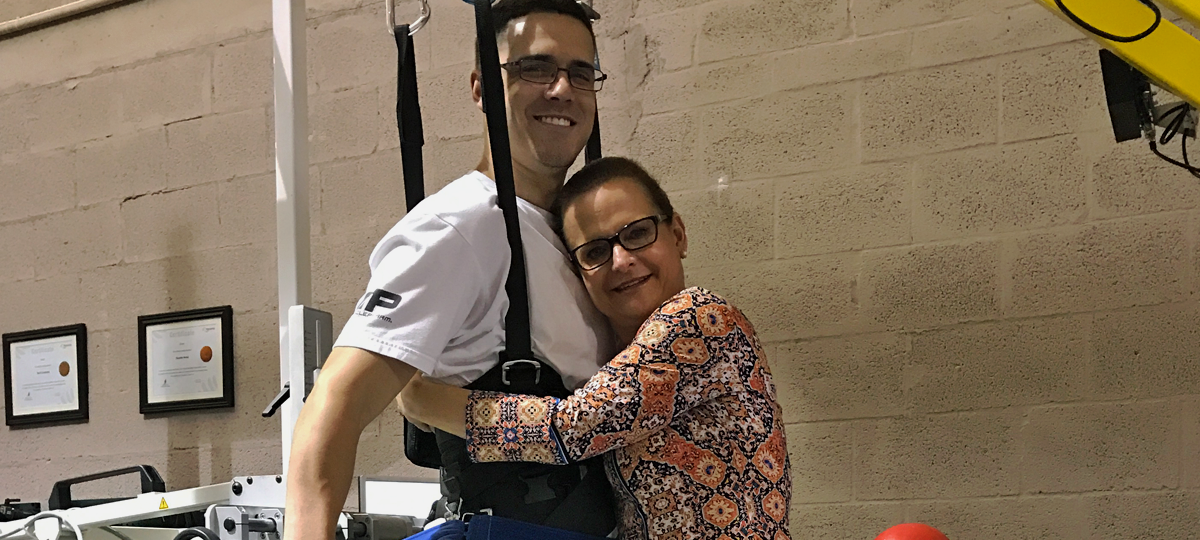 Family member supporting a client at iAM ABLE